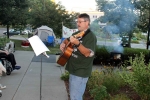 A Woodlawn Commons employee entertaining with his guitar.