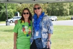 Two employees posing at Wesley's annual employee picnic.