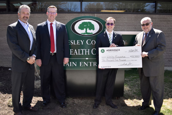 Adirondack Trust Company presenting a check to The Wesley Community.