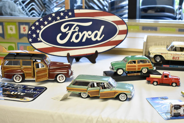 Model cars and ford plaque