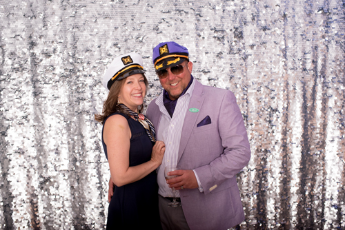 smiling couple with sailor hats